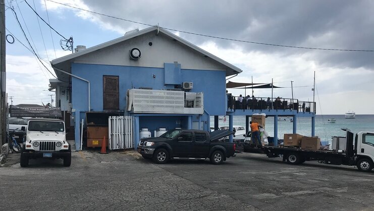 picture of the parking lot at the lobster pot dive center