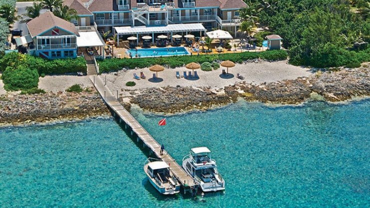 picture of dock and two boats at cobalt coast resort