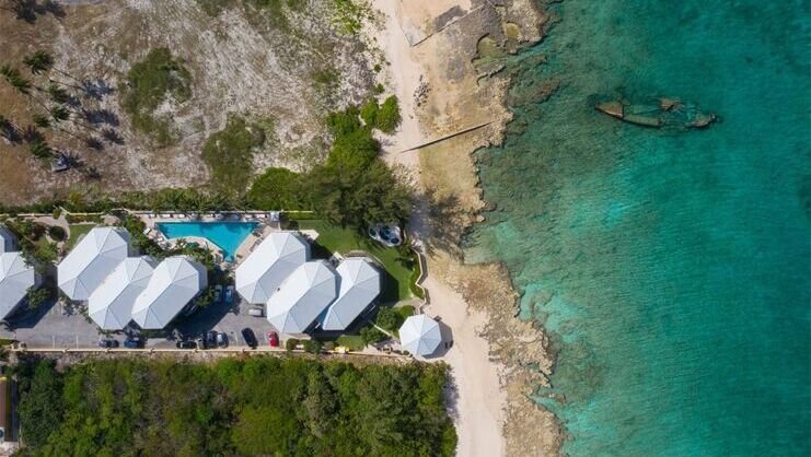 aerial photo showing condos and wreck of the gamma