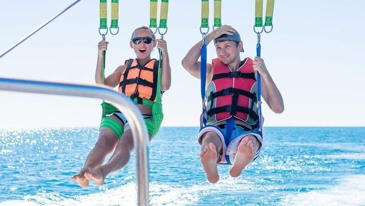 picture of two people parasailing