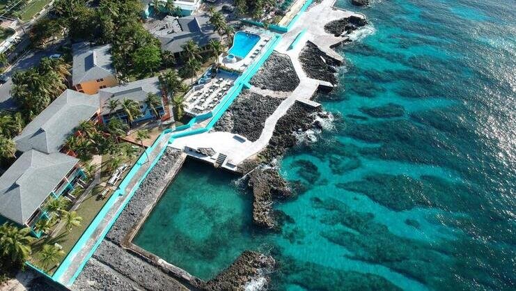 aerial image of water off of sunset house