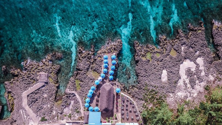 aerial picture showing sea and macabuca